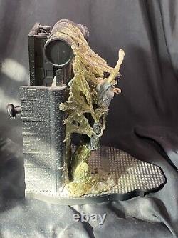 MCFARLANE The cocooned victim on the Alien Queen display base