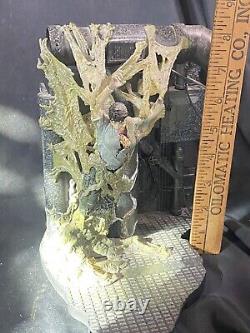 MCFARLANE The cocooned victim on the Alien Queen display base